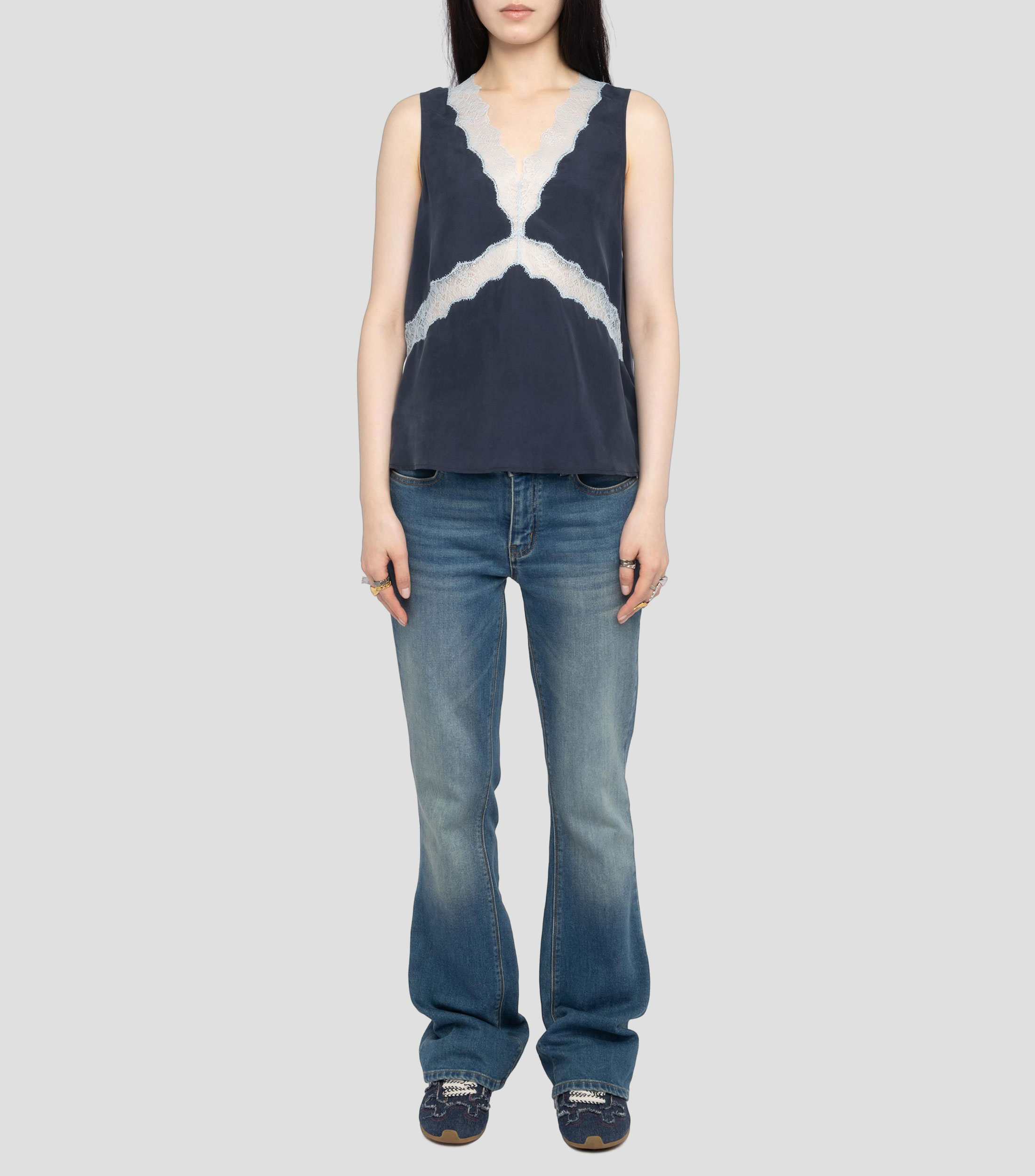 Blusa lisa sin mangas Mujer